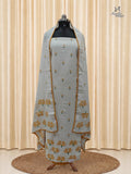 White Mul Cotton Churidar With Mustard Yellow Floral Detailing