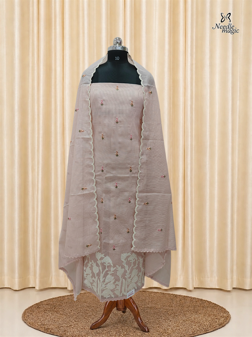 Soft Peach Net Cotta Churidar with floral Applique
