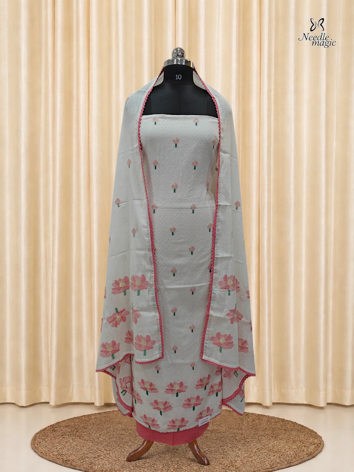 White Mul Cotton Churidar With Soft Pink Floral Detailing